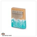 نمای جانبی کالیمبا چوب و رزین آبی با طراحی دریا و رنگ هنری